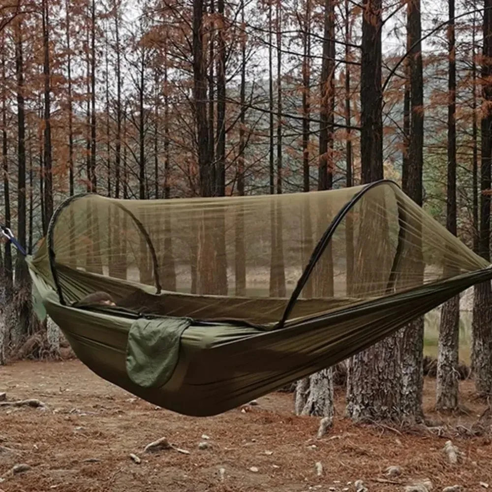 Outdoor camping hammock with mosquito net. Made of strong parachute fabric.